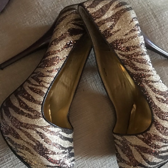 Charlotte Russe Shoes - Zebra pump heels size 8